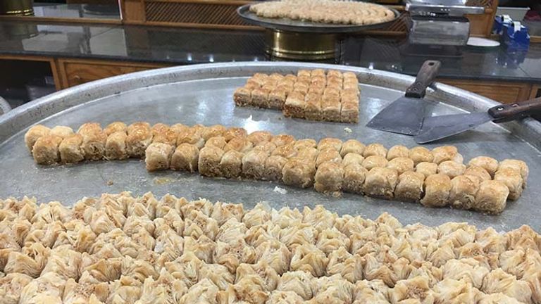 At Amal Bosahli, the baklava is presented in large trays and sold by the piece or by the box. // © 2017 Giselle Abcarian