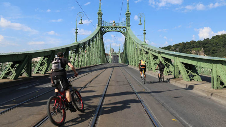 Bikers, like those in Budapest, get a chance to experience the city from a local’s point of view. // © 2016 Mindy Poder