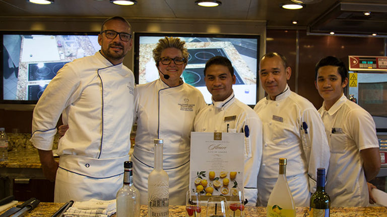 Chef Kathryn Kelly (center) and her team lead several intimate cooking classes per cruise. // © 2017 Mindy Poder