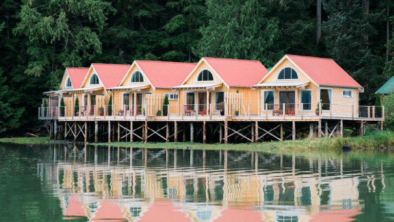 Guests can watch the tide ebb and flow from a Nimmo Bay Resort cabin. // © 2017 Nimmo Bay Resort