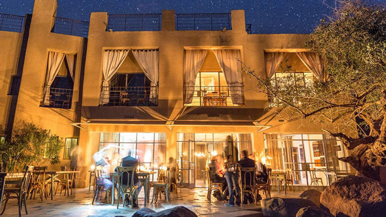 Guests dine under the stars at Feynan Ecolodge. // © 2018 Feynan Ecolodge/Brian Scannell