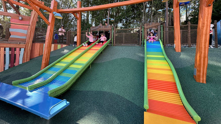 Special slides make it easier for kids to get off without slowing down the queue.